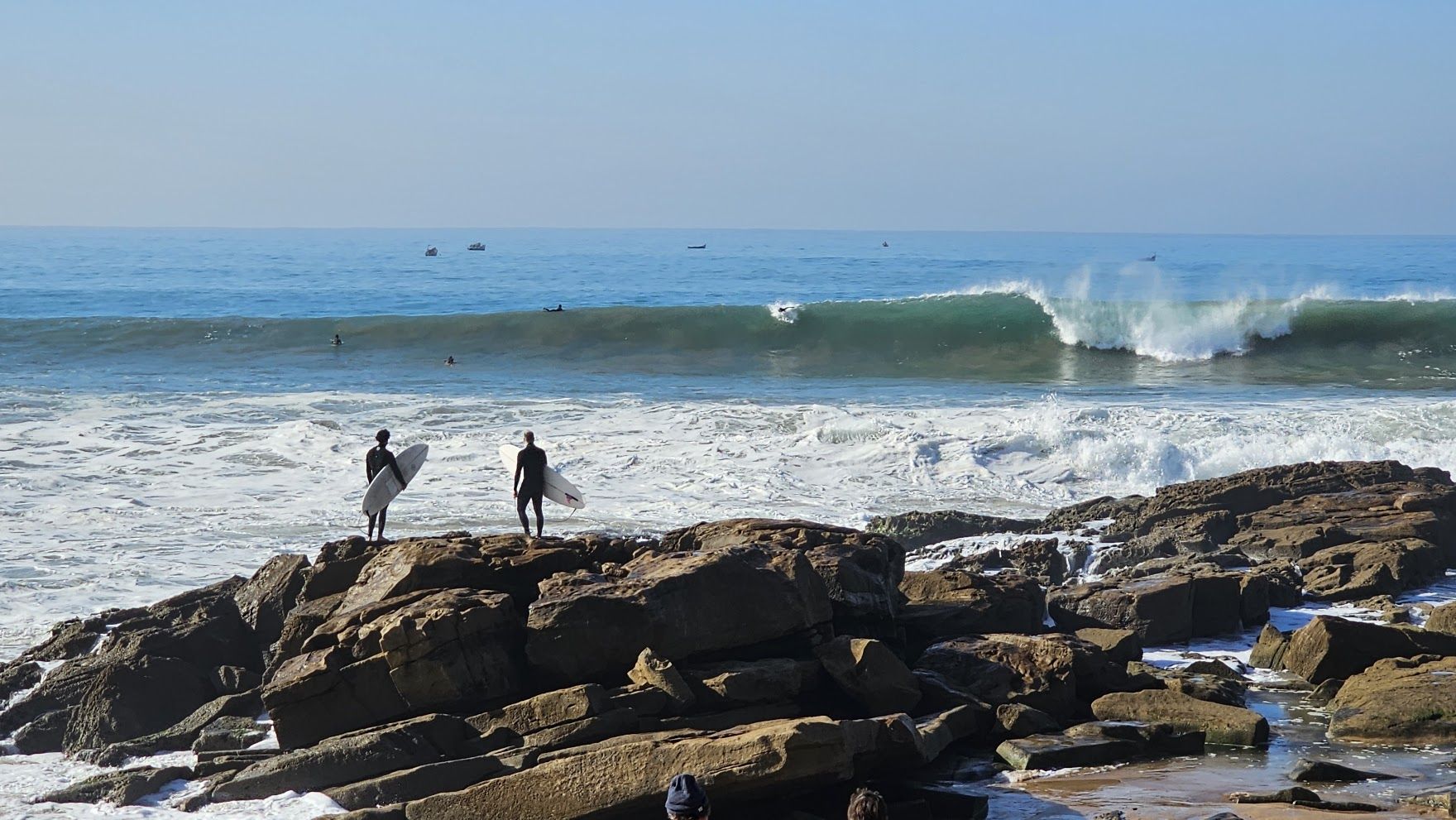 anchor point taghazout wave surfers rocks | Twist Surf