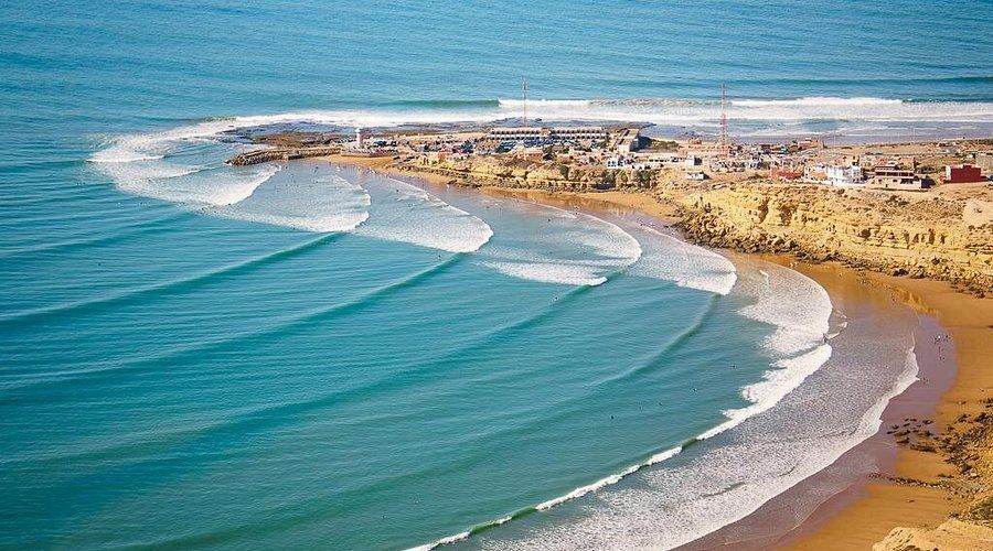 Aerial view of the long right-hand waves peeling into Imsouane bay, Morocco